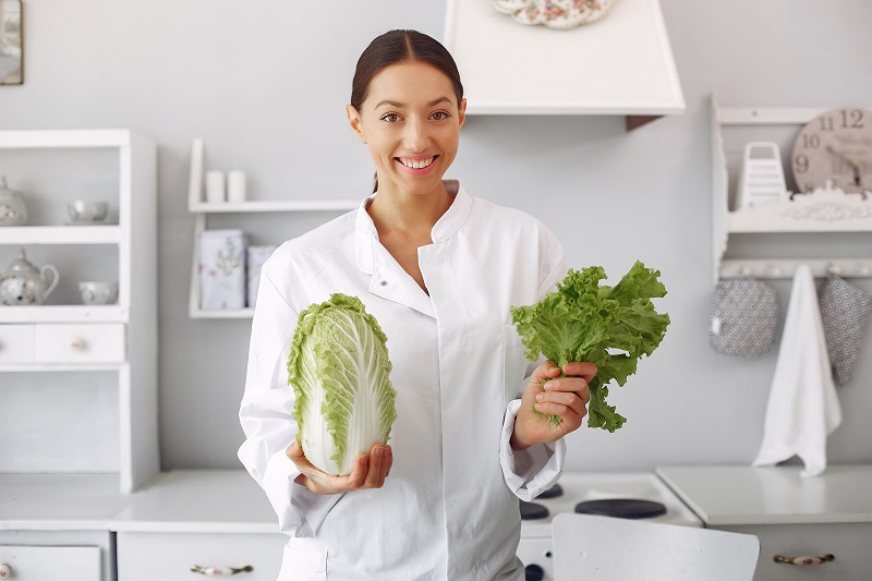 doctor-in-a-kitchen-with-vegetables.jpeg